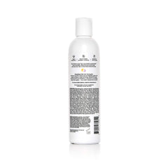 Overtone Purple Toning Conditioner applied to damp hair for brassiness reduction