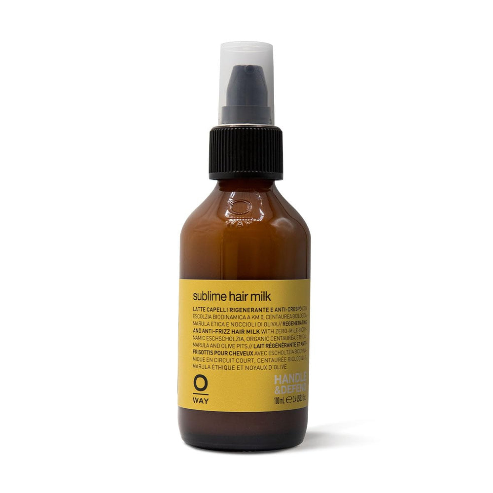OWAY Sublime Hair Milk bottle pour for frizz control and a smooth finish.