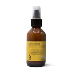 OWAY Sublime Hair Milk bottle pour for frizz control and a smooth finish.