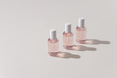 OxygenCeuticals Fermented Fluid with arbutin and niacinamide targets even tone.