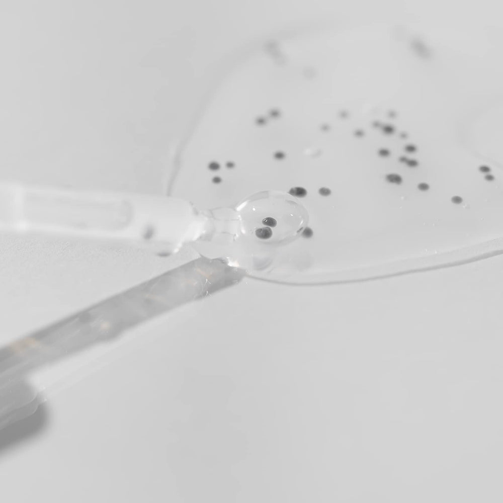 OxygenCeuticals Caviar Protein Fluid being dispensed for smooth application.