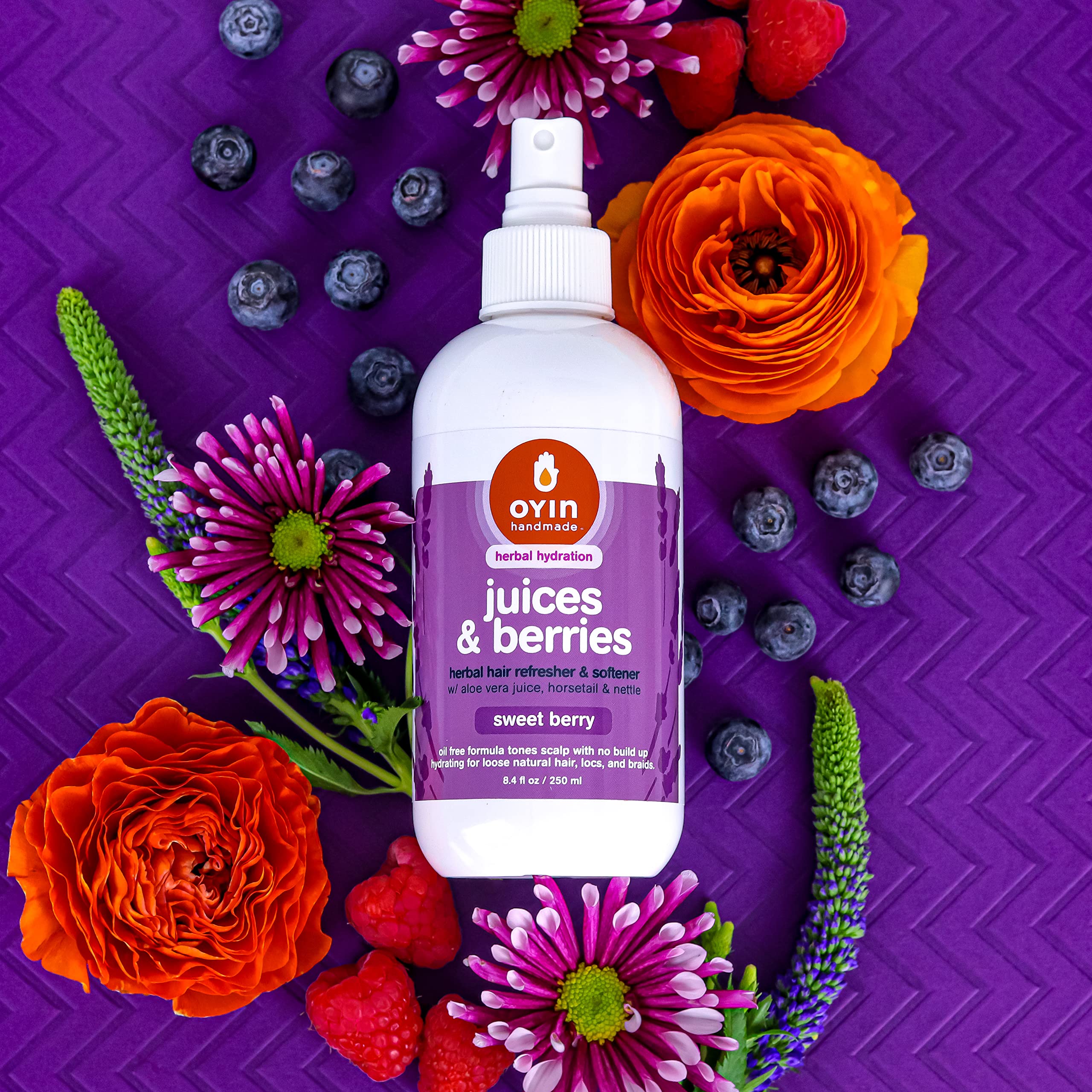 Oyin Handmade Juices & Berries scalp nourishment for healthy strands.
