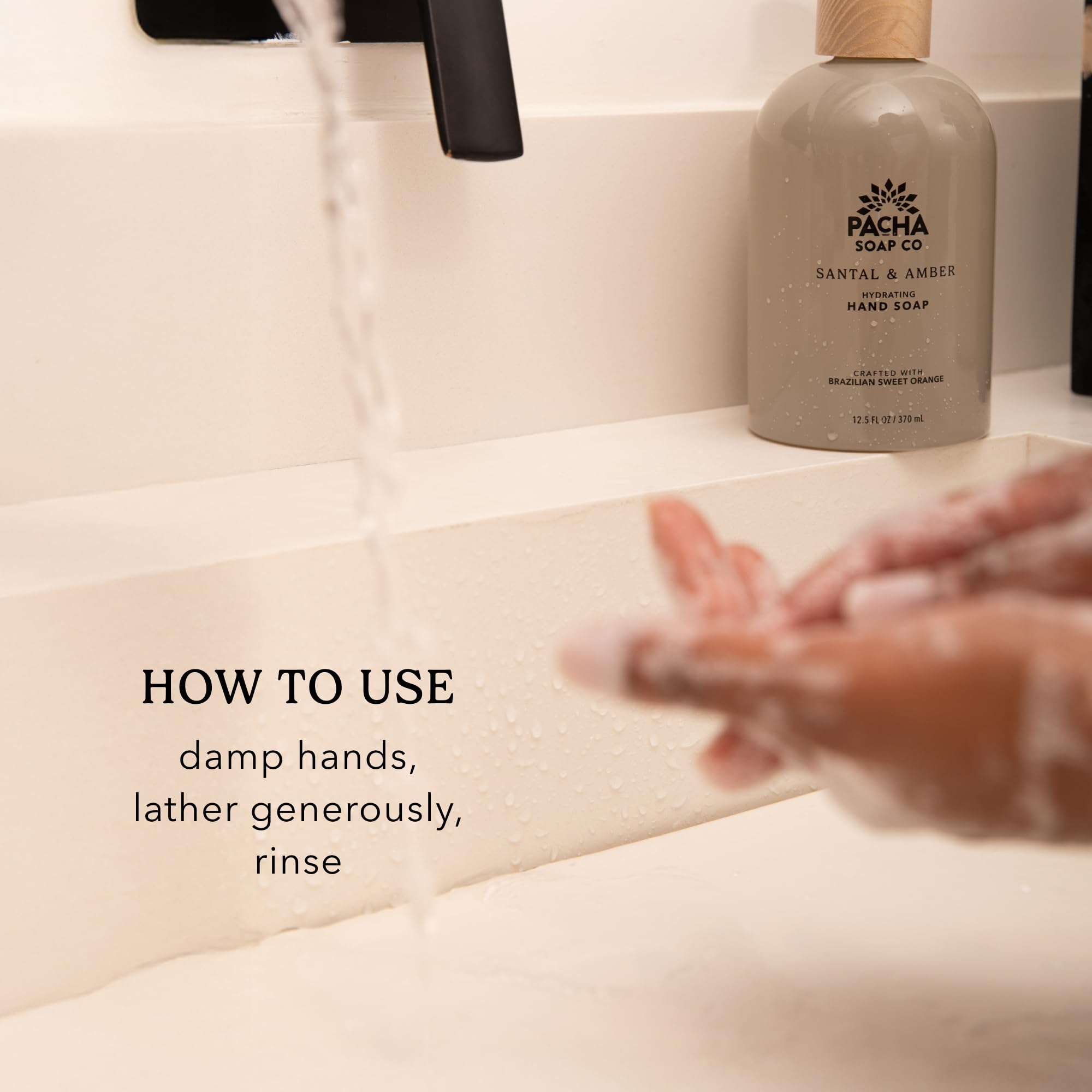 Creamy lather from White Blossom & Fig hand soap on hands