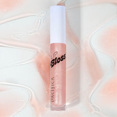Pacifica Lip Bloss Berry Juice closeup shows sheer tint and luminous gloss