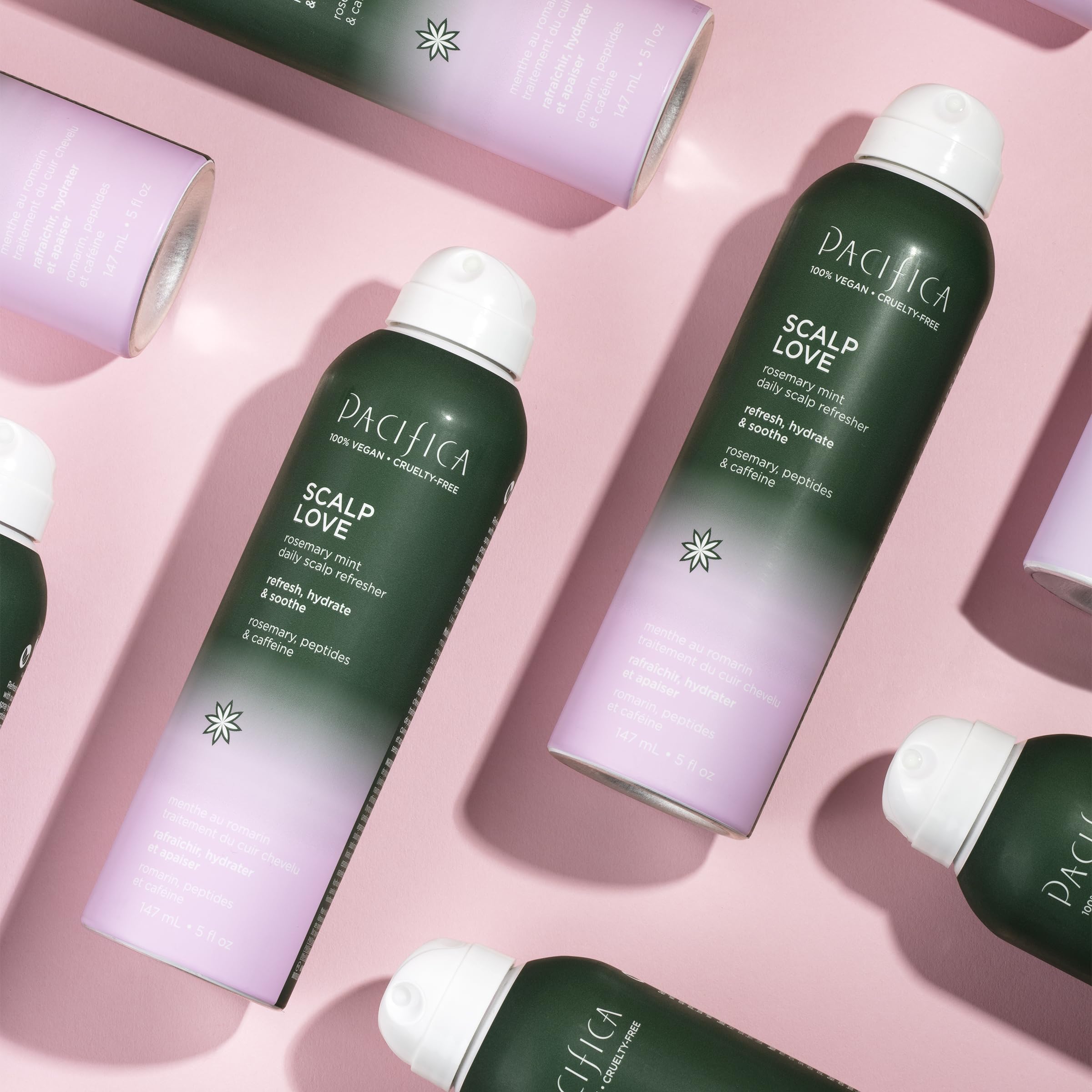Pacifica Serum Spray clear bottle-massage action illustrates soothing scalp moisture boost.