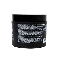 Pacinos clay paste in hands, ready for shaping textured styles.