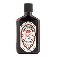 Packer's Pine Tar Conditioner bottle with pine needles promotes moisturized, manageable hair.