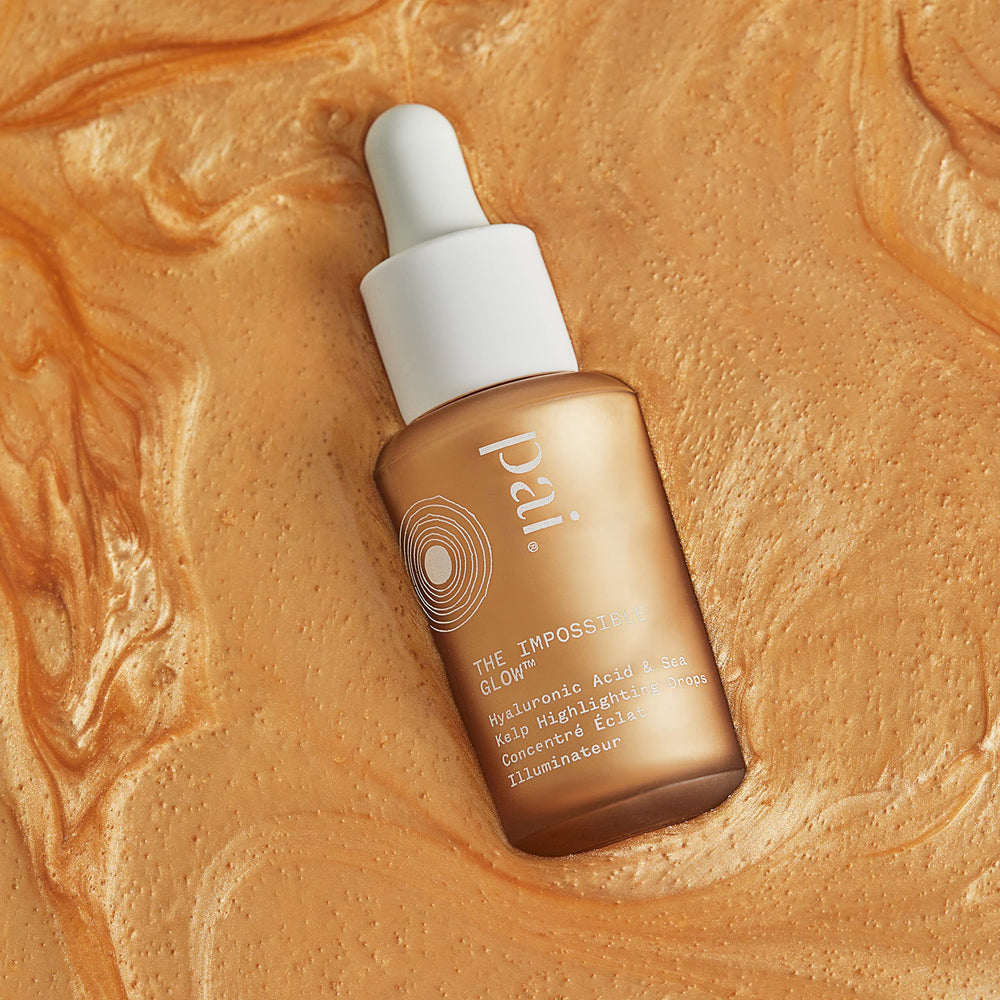 Pai Skincare glow drops dropper shows light-reflecting hydration on skin.