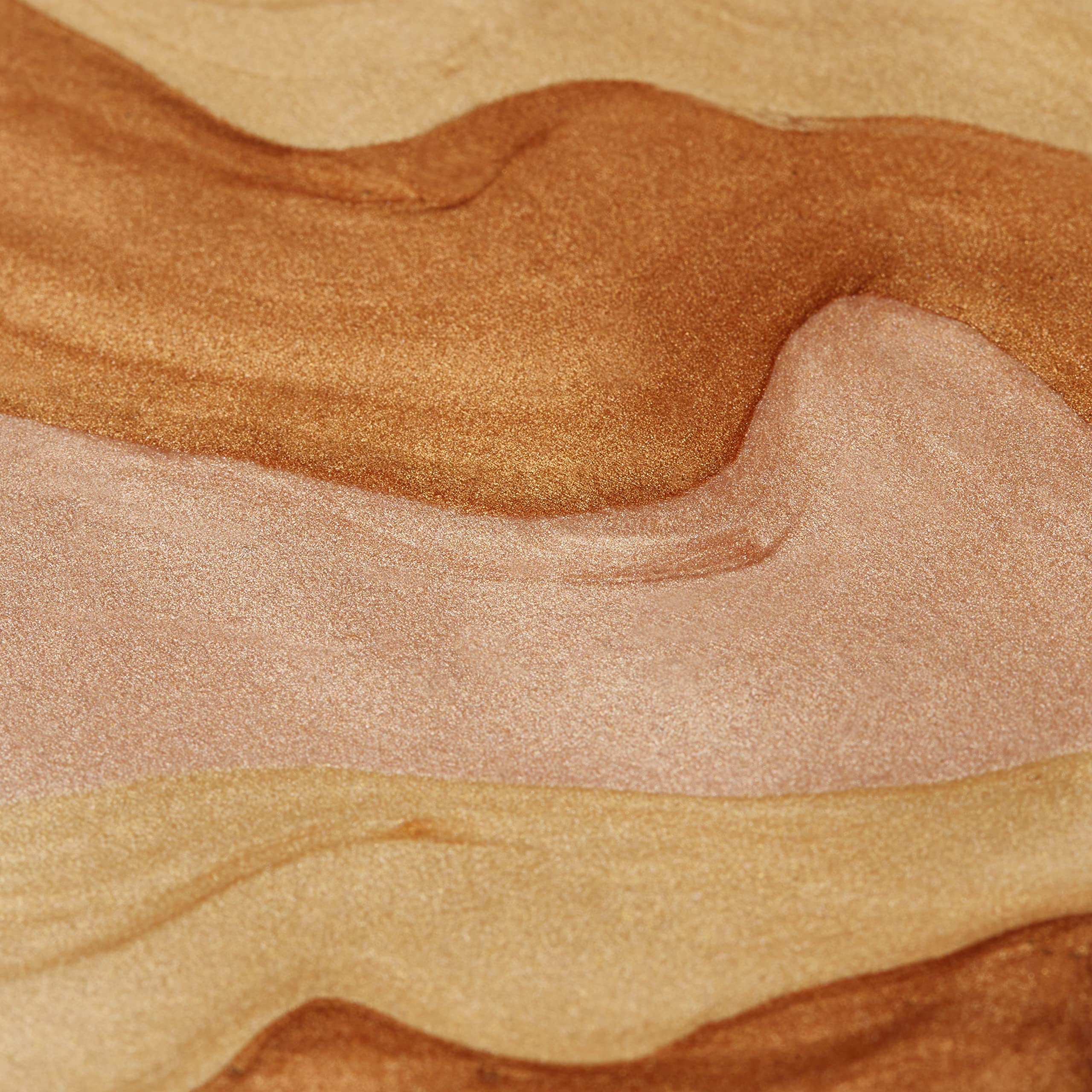 Swirl of champagne-colored glow on skin during morning light.