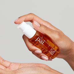 PAI SKINCARE Light Work Rosehip Cleansing Oil texture on skin for a refreshing wash.