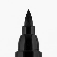 Dramatic wing created with a single stroke using Palladio carbon black eyeliner.
