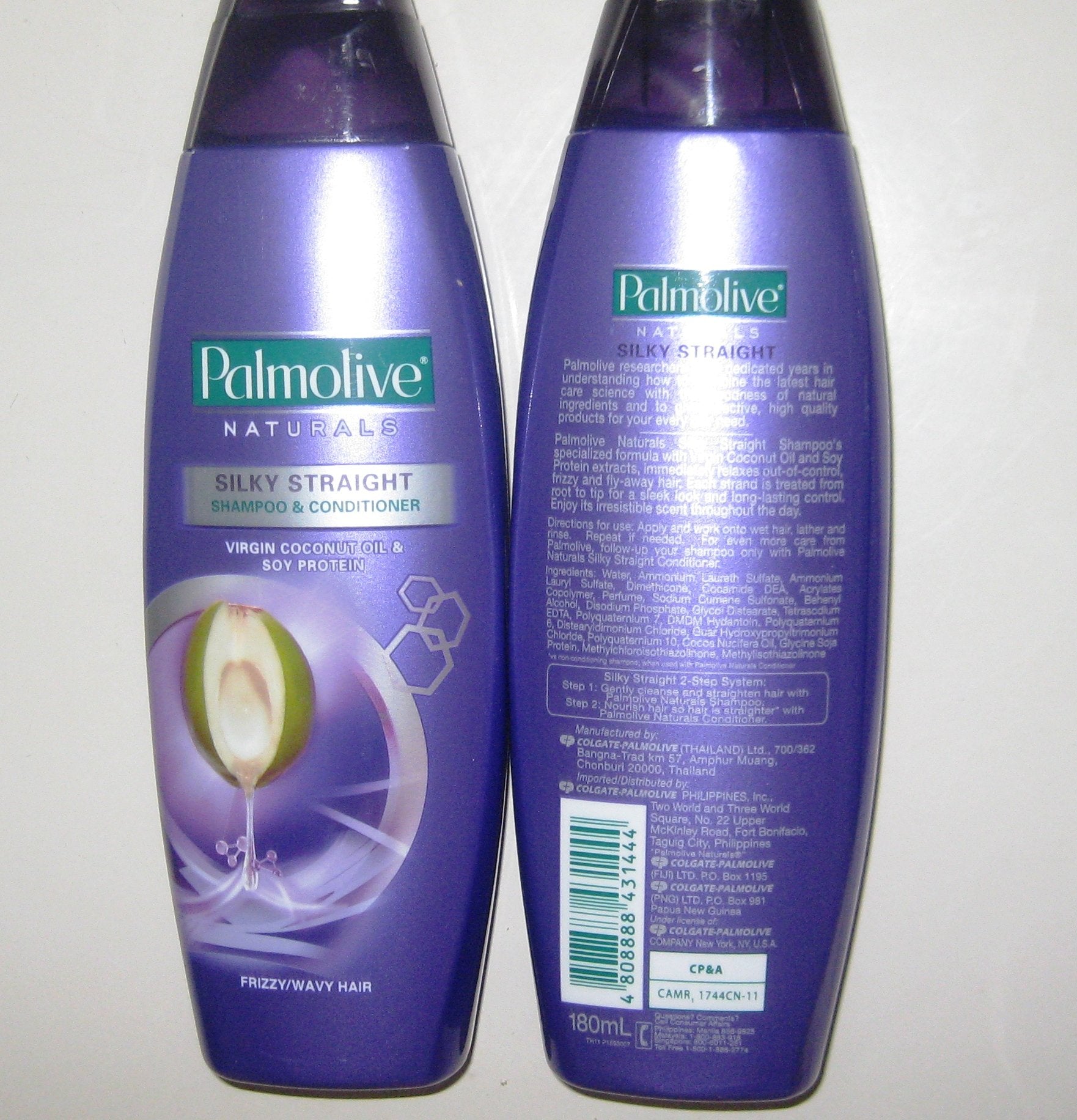 Palmolive Naturals Silky Straight Conditioner bottle nourishes ends for manageable waves.