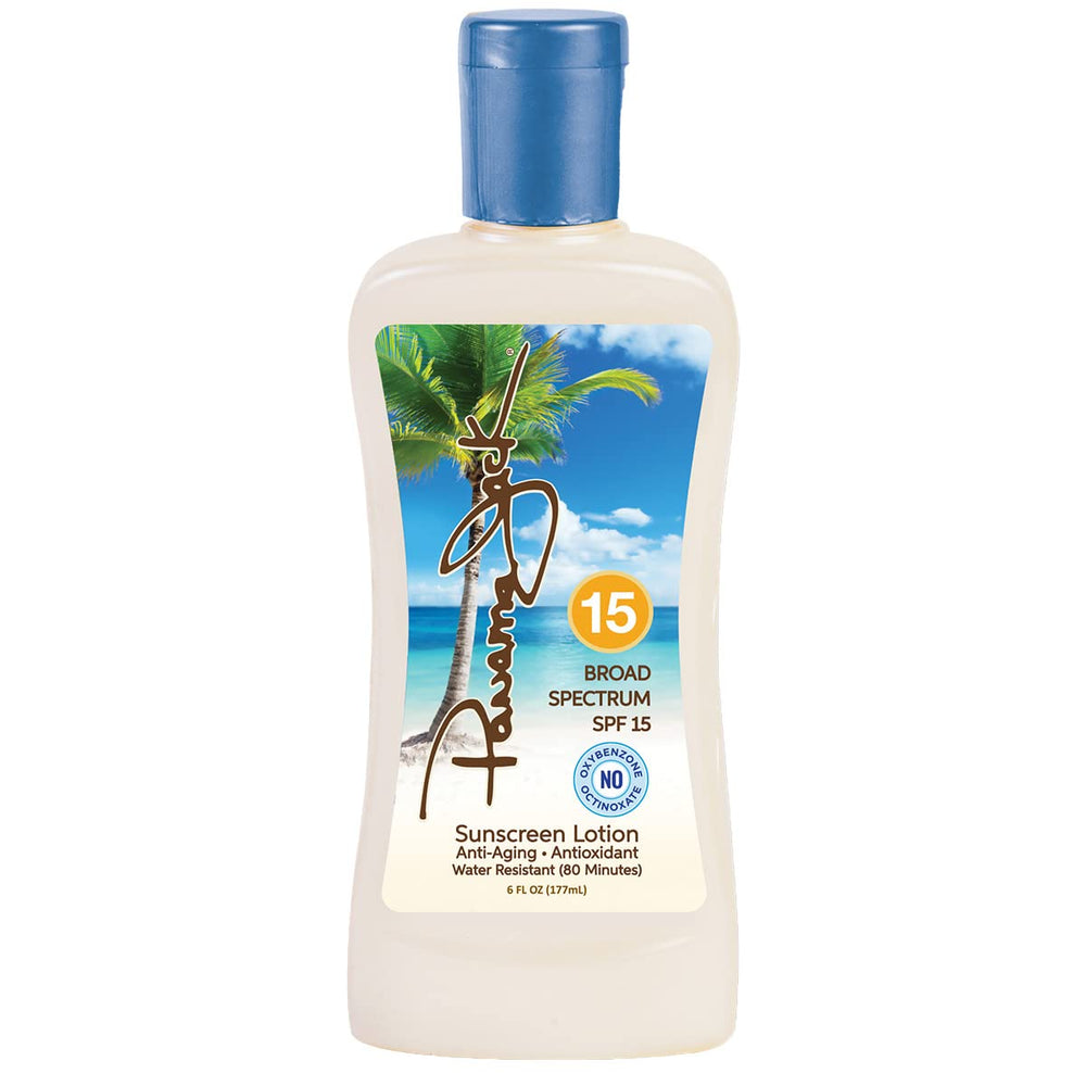 Panama Jack Sunscreen Lotion SPF 15 bottle on the beach protects skin during sun exposure.