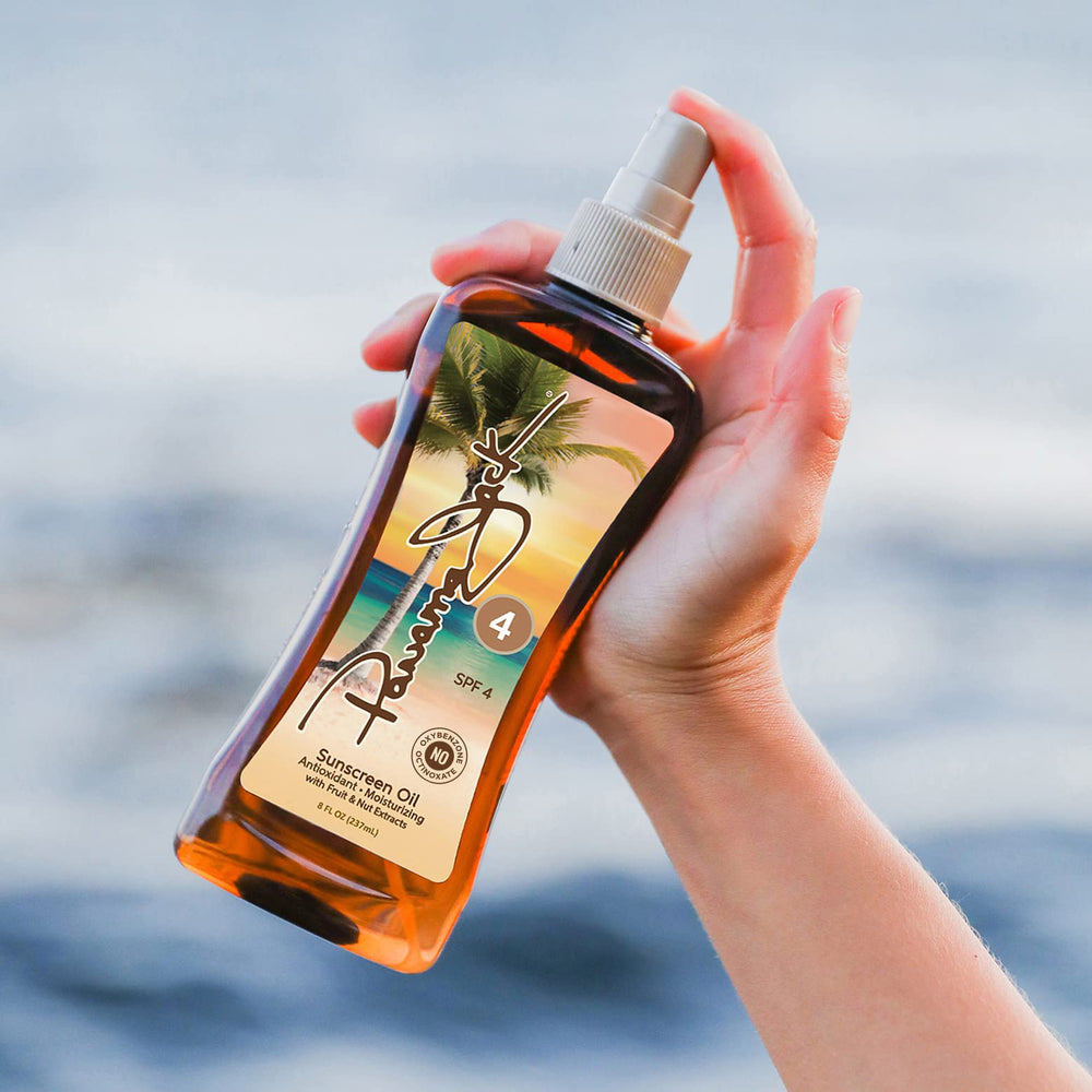 Panama Jack Sunscreen Tanning Oil pump spray cap for angled use.
