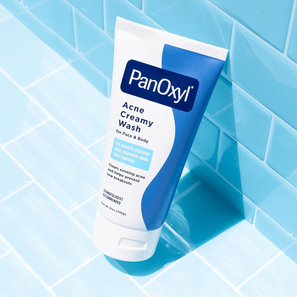 PanOxyl Creamy Acne Wash applied to face for gentle pore cleansing