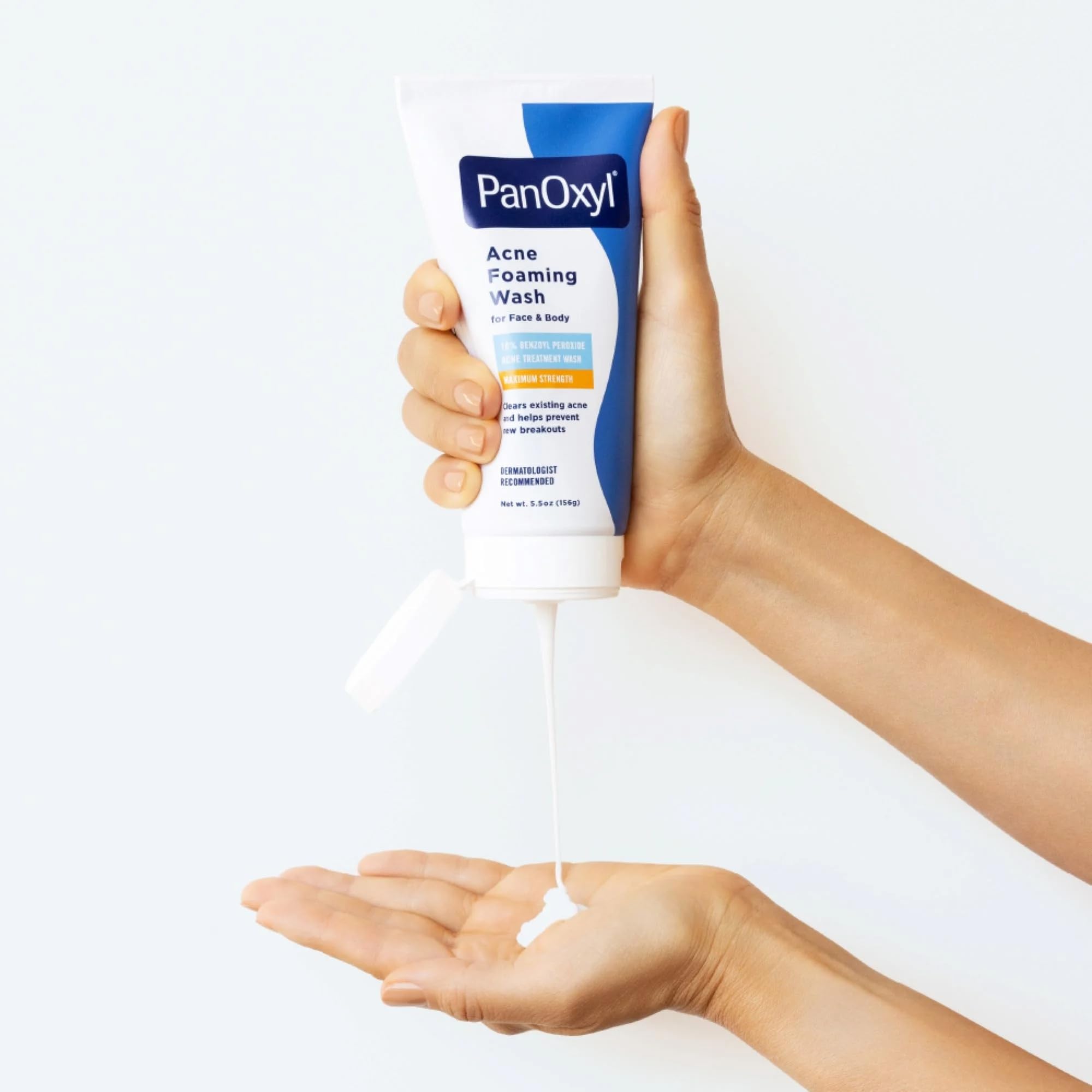 PanOxyl Foaming Acne Wash on a sink with water droplets for refresh.
