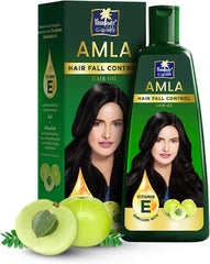 Parachute Advansed Amla Hair Oil bottle close-up promotes scalp nourishment.