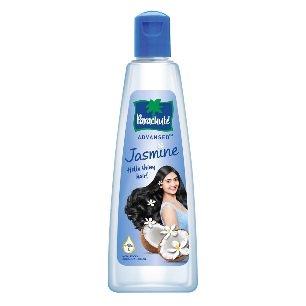 Parachute Advansed Jasmine Coconut Oil pour demonstrates smooth application for even coverage.