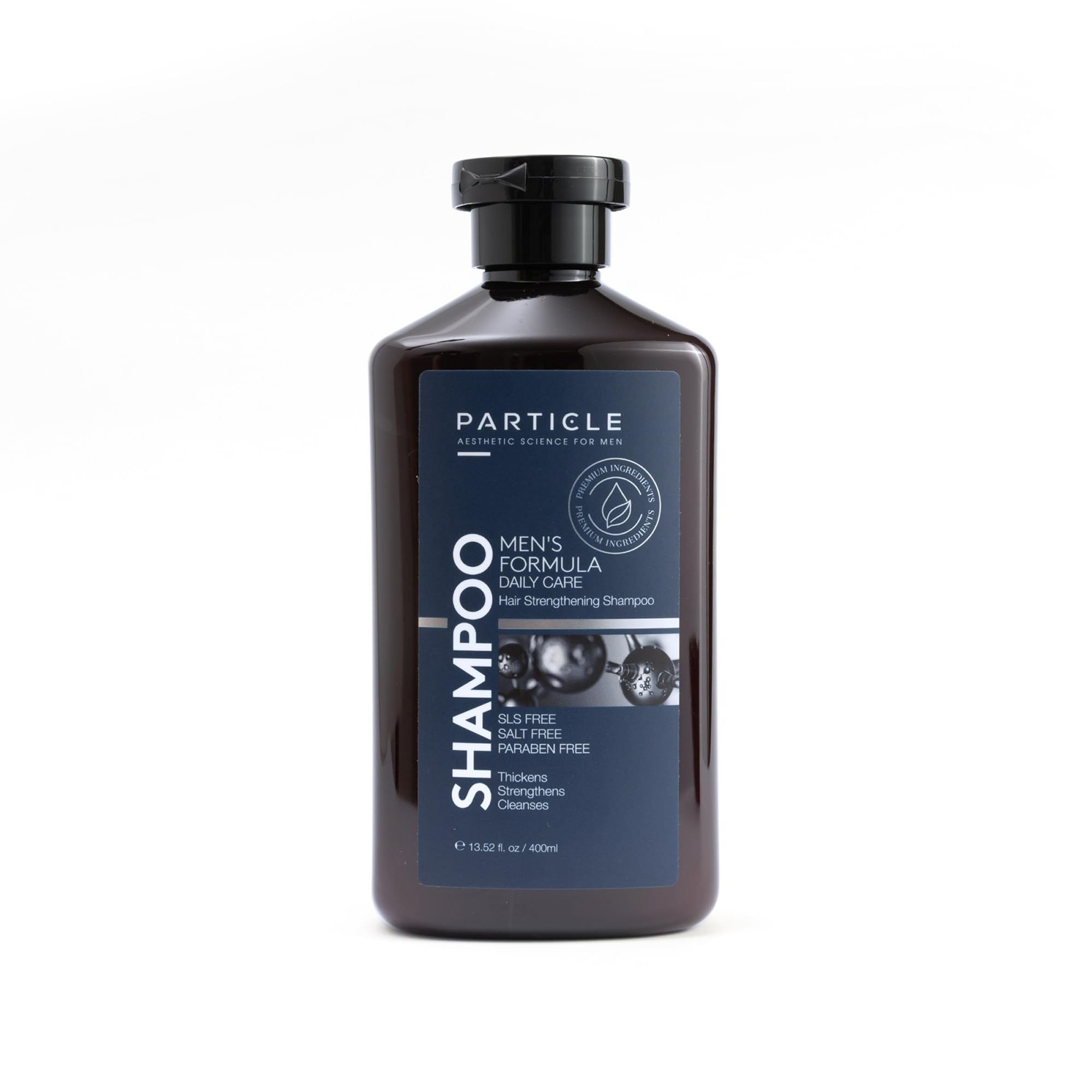 Particle Hair Thickening Shampoo bottle close-up showcases the biotin blend for stronger-feeling hair.