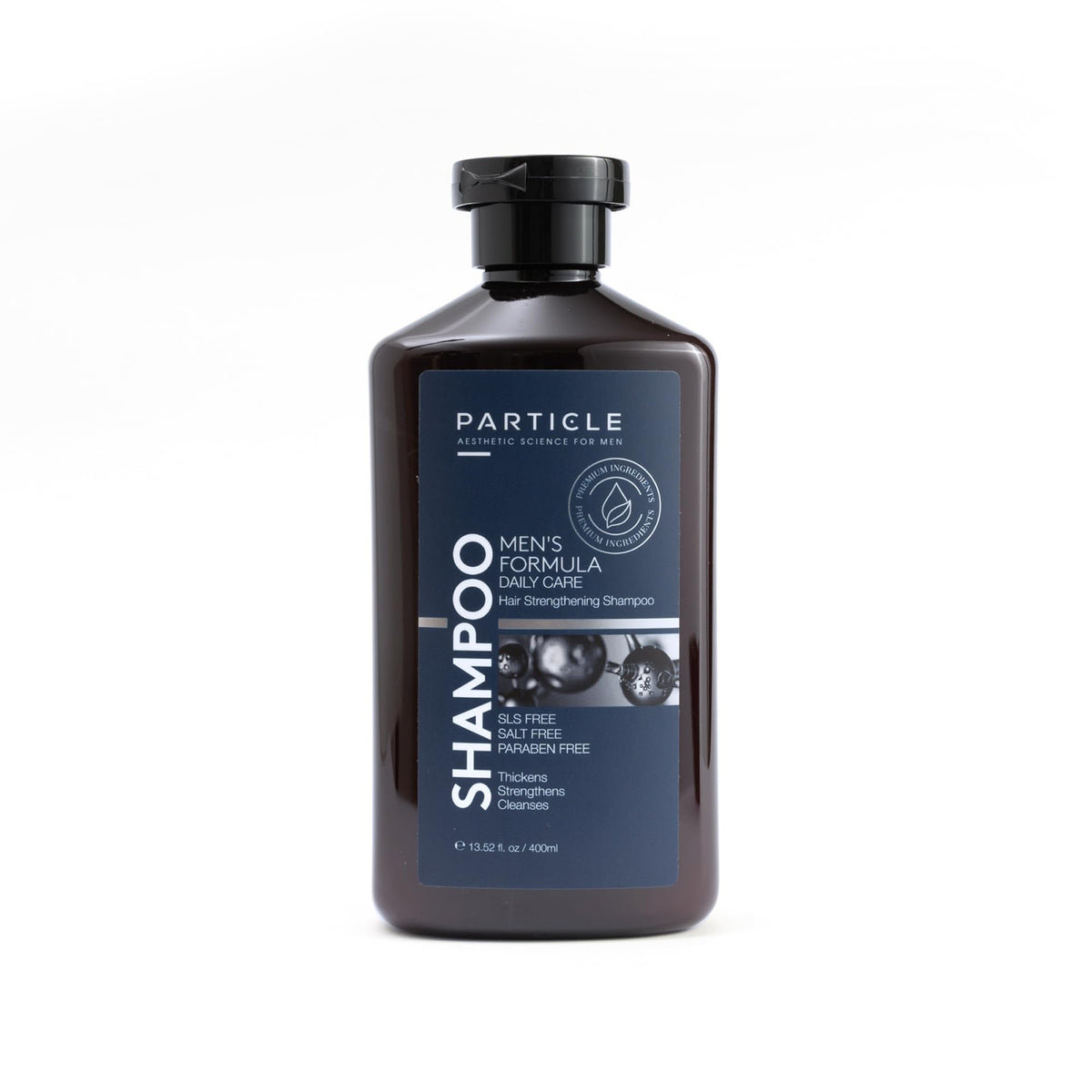 Particle Hair Thickening Shampoo bottle close-up showcases the biotin blend for stronger-feeling hair.