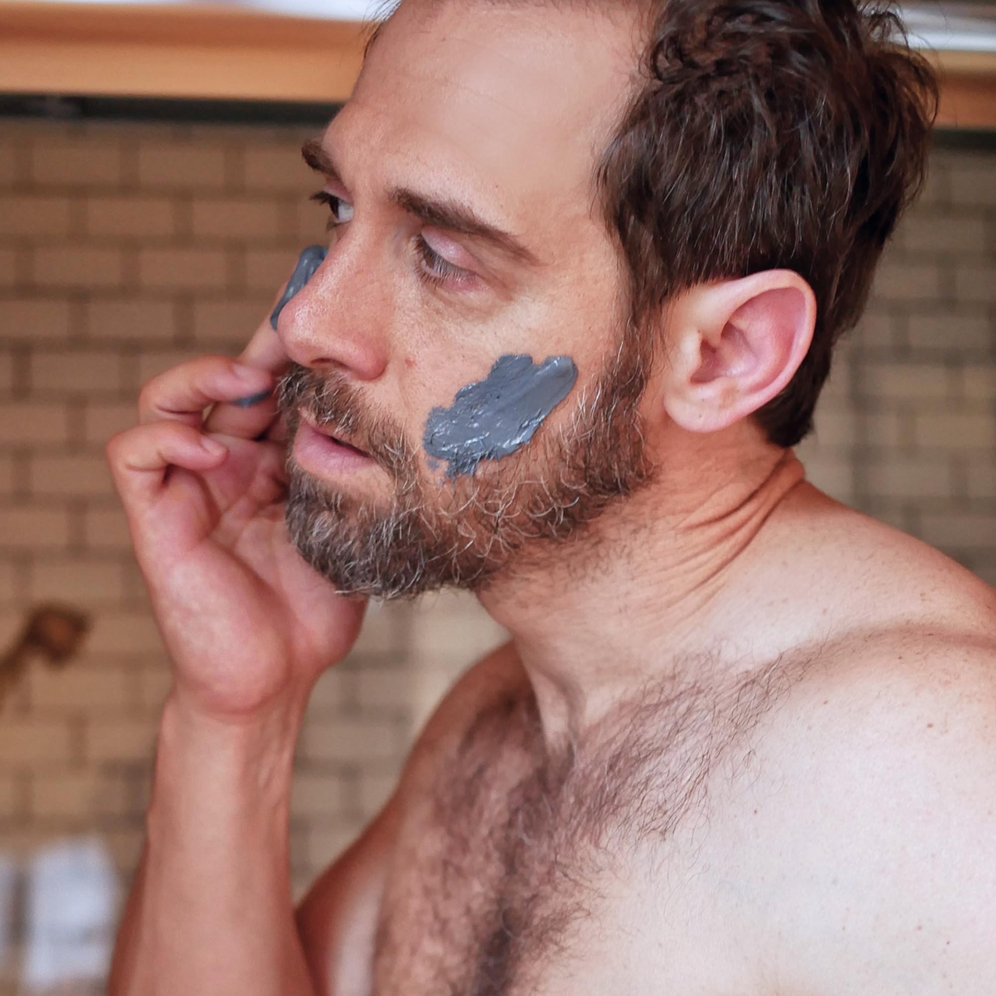 Particle Mineral Face Mask for Men in gym bag ready for routine.