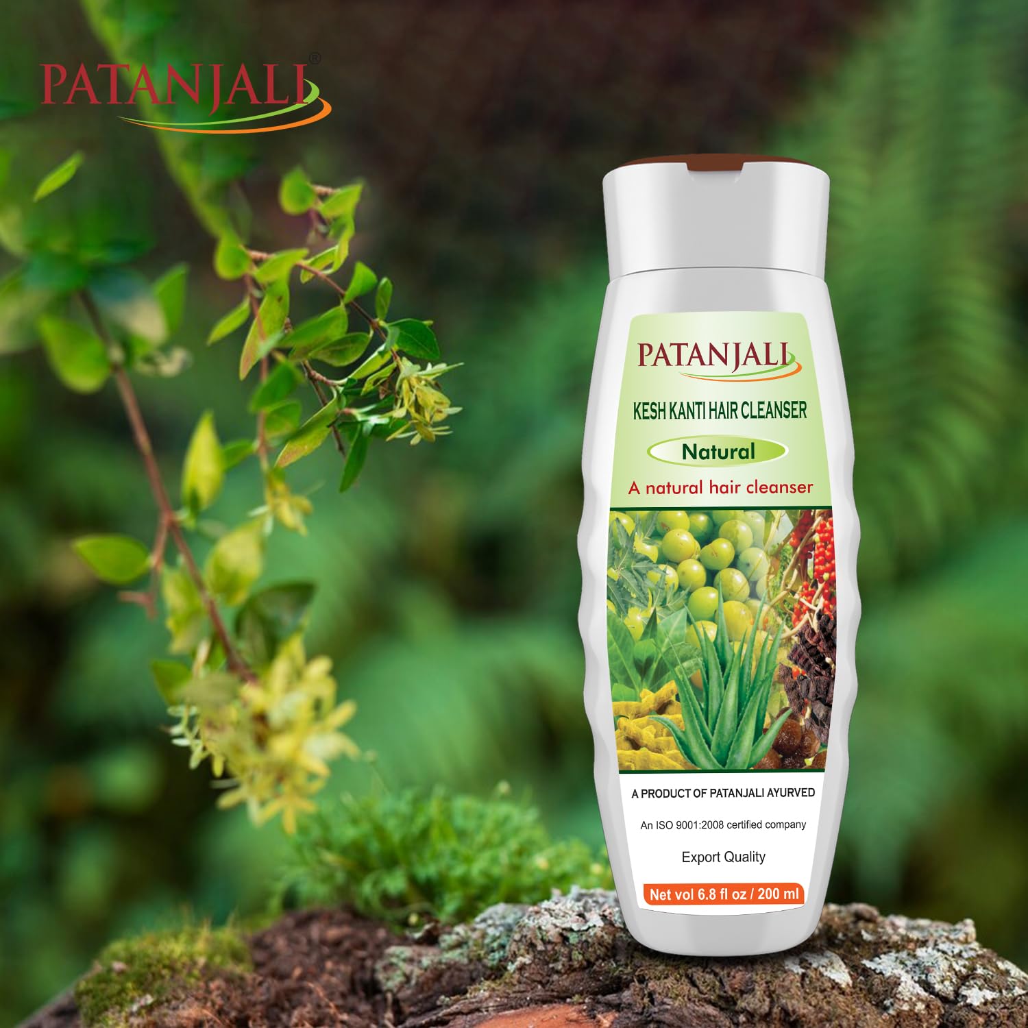 Patanjali Kesh Kanti applying onto hair during routine
