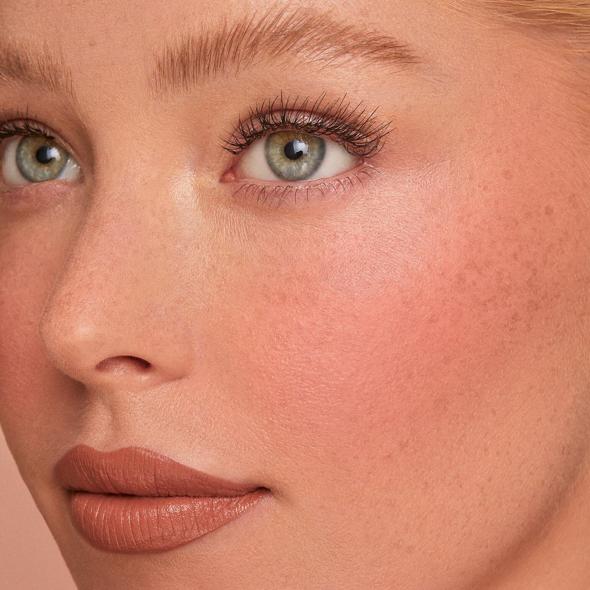Powder blush texture close-up, silky finish and buildable color