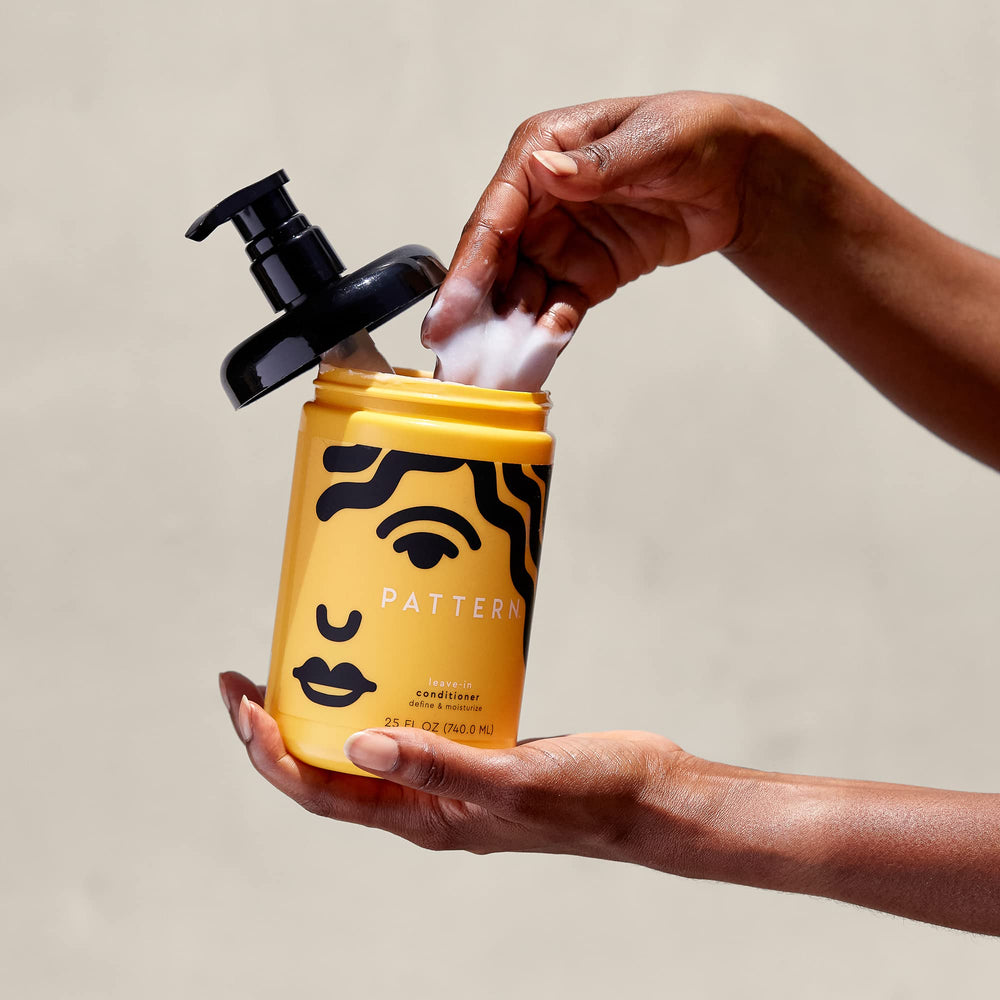 PATTERN Beauty Leave-In Conditioner applying to hair for detangling and softness.