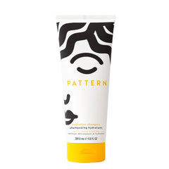 PATTERN Beauty Wash N Go Kit box front with three styling essentials.