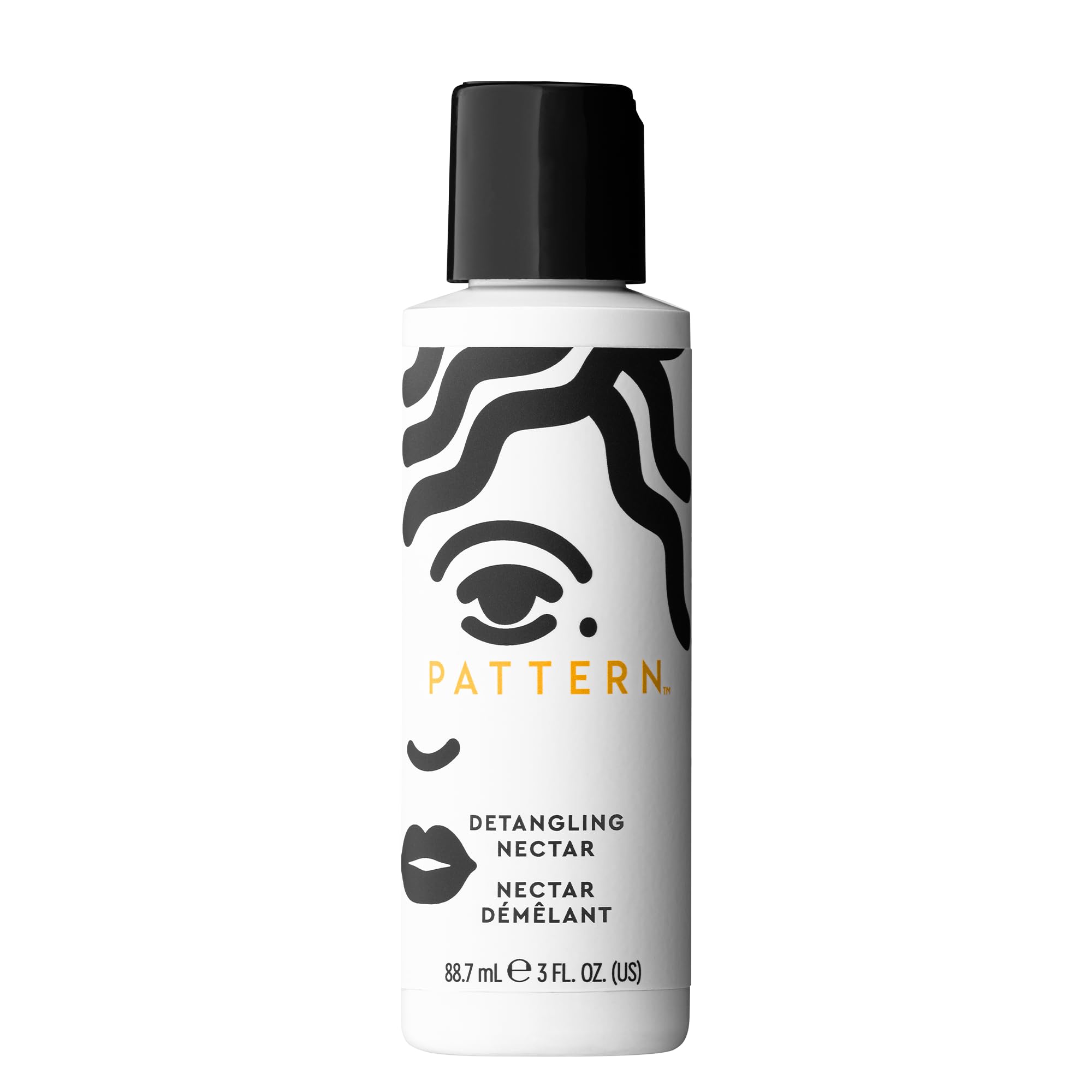 PATTERN Detangling Nectar bottle pour shows smooth slip for easy detangling.