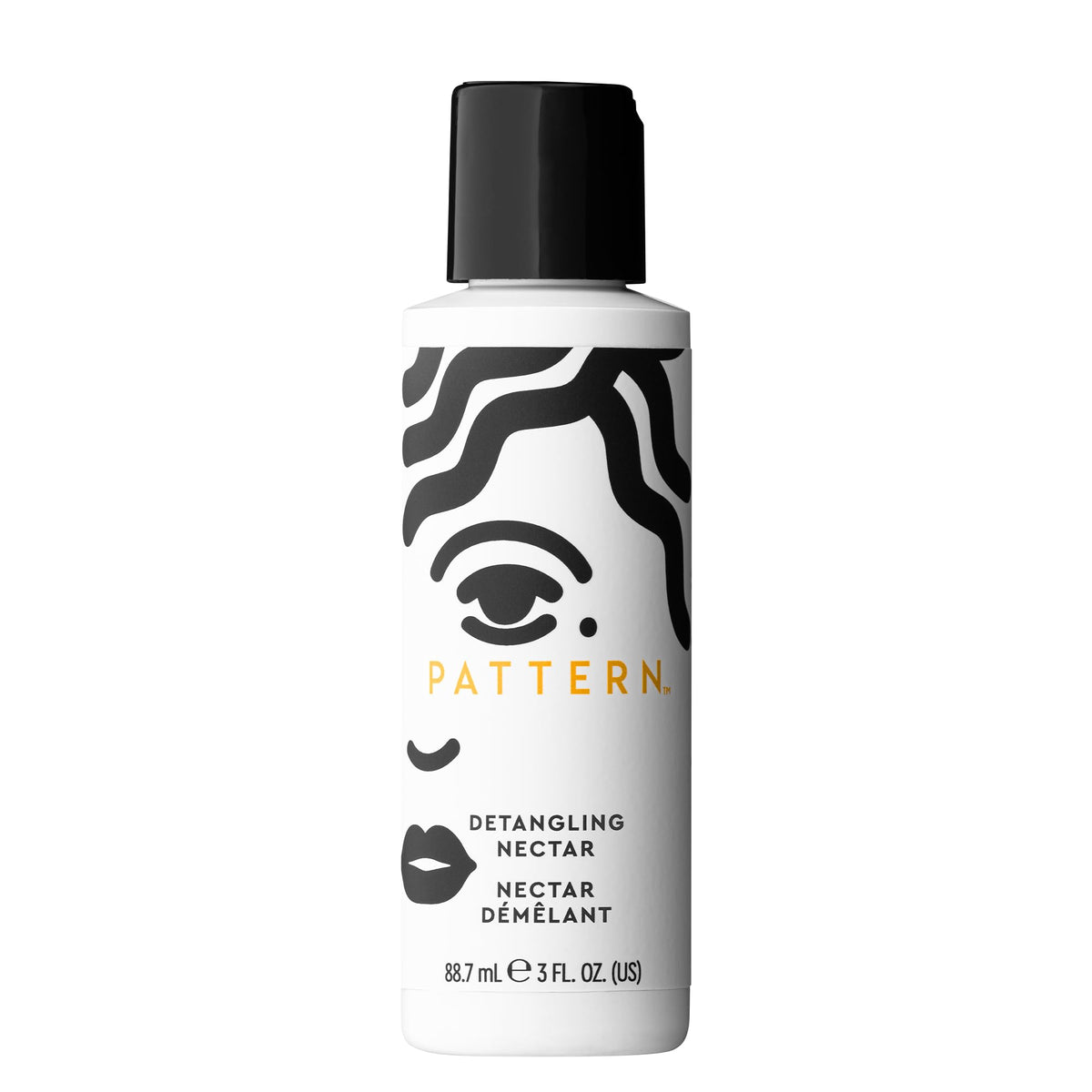 PATTERN Detangling Nectar bottle pour shows smooth slip for easy detangling.