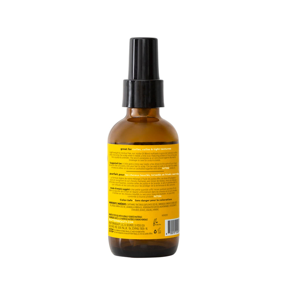PATTERN Jojoba Hair Serum on wet hair use highlights easy distribution.