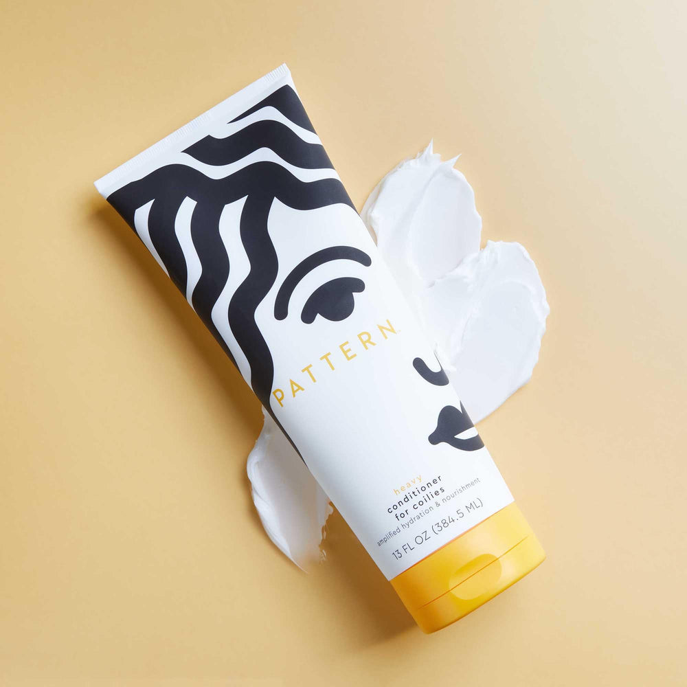 PATTERN rich hydration texture shown on curls for a glossy finish.