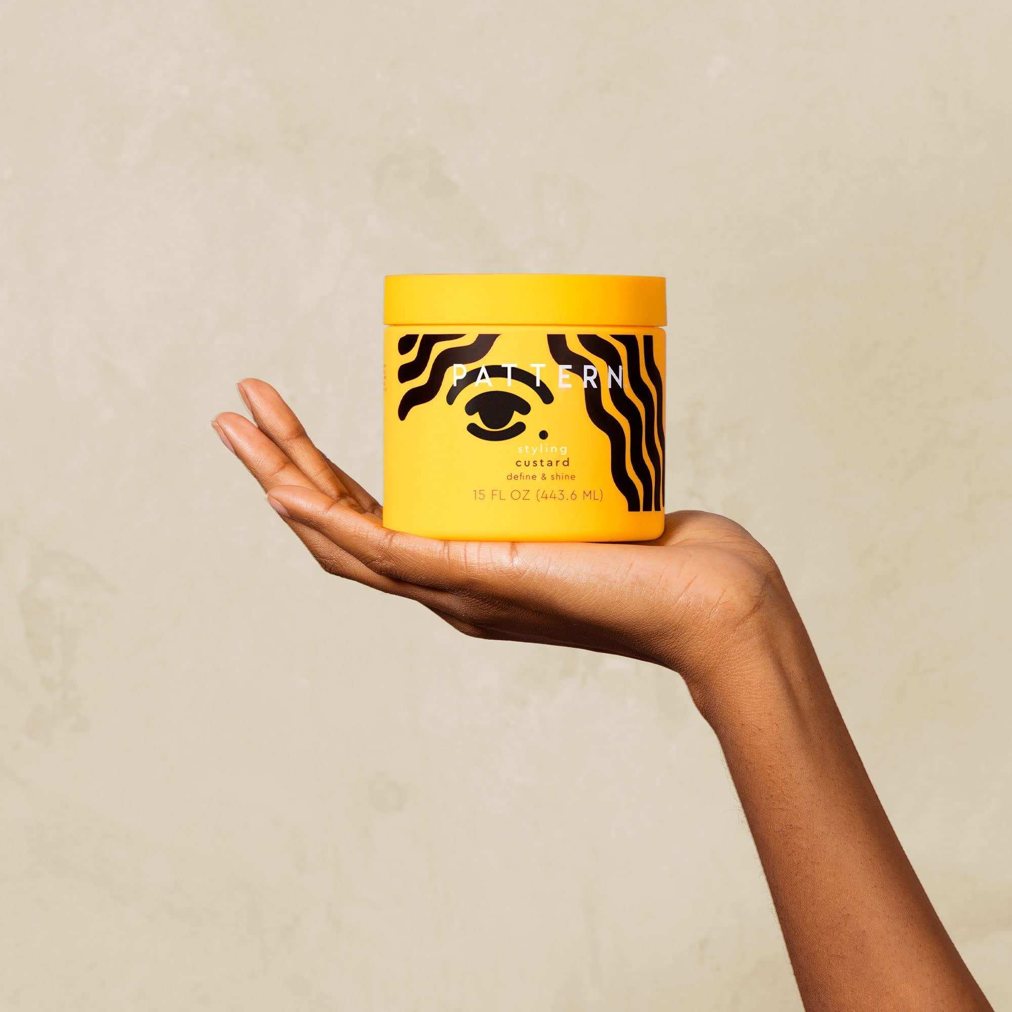 PATTERN Styling Custard close-up reveals curl definition and natural shine.