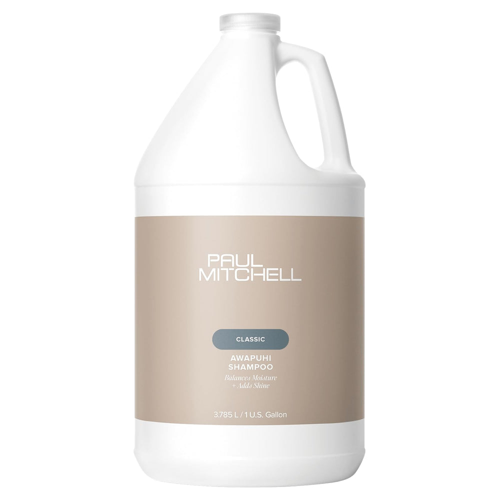 Paul Mitchell Awapuhi Shampoo gallon bottle pour showcases balanced moisture for color-treated hair.