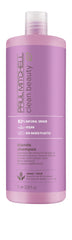 Paul Mitchell Clean Beauty Blonde Purple Shampoo bottle on vanity for bright blondes
