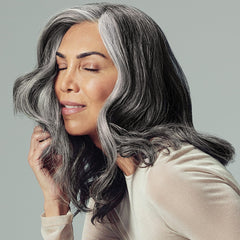 Hair after use showing glossy finish and fullness
