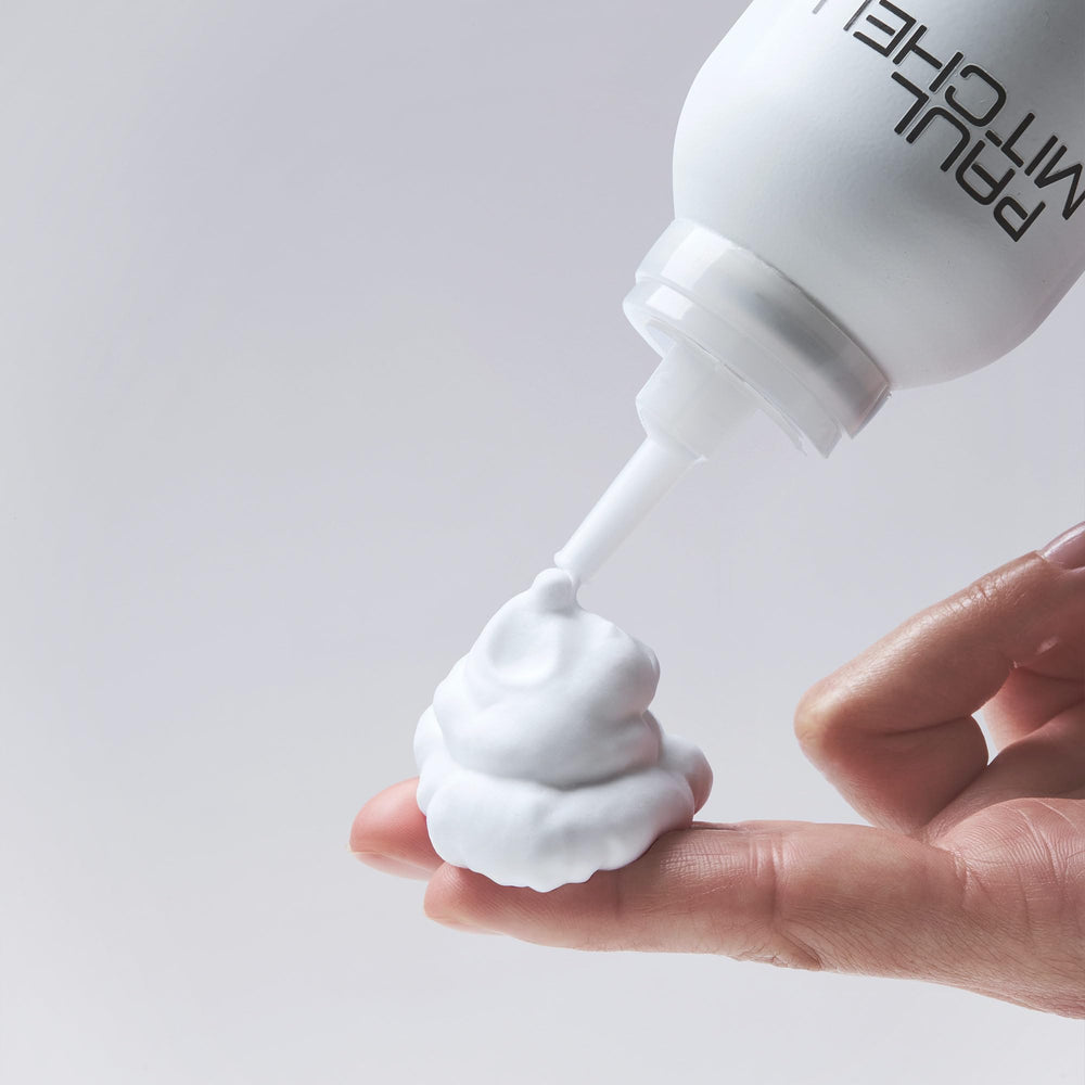 Paul Mitchell Sculpting Foam closeup shows mousse texture.