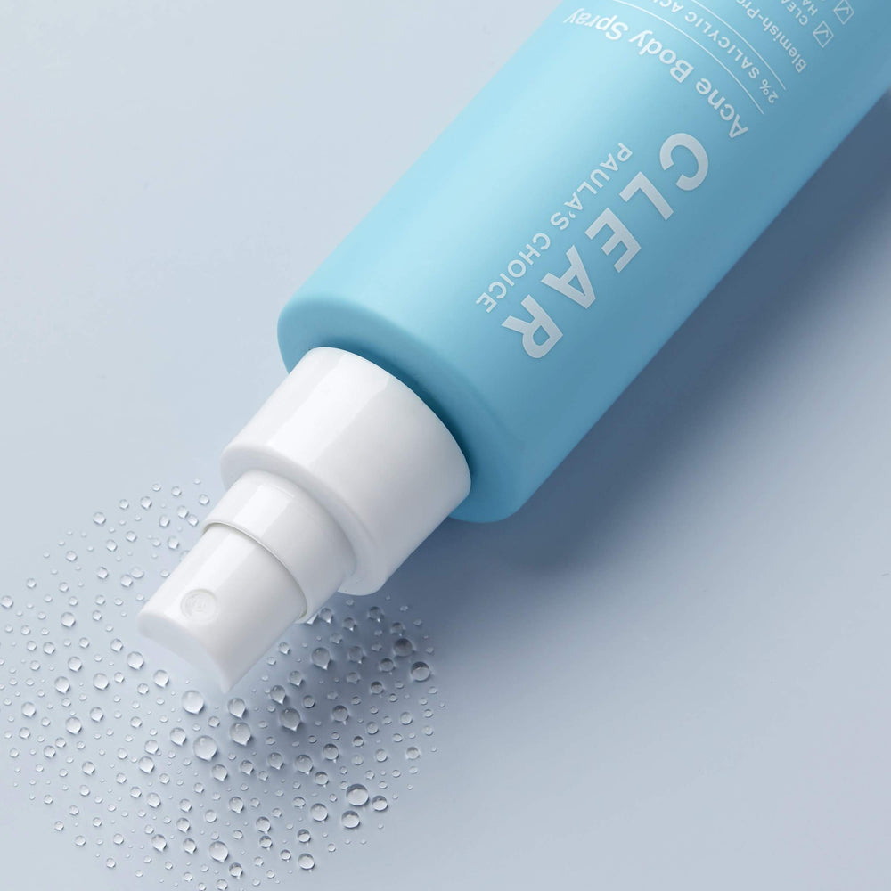 Paula's Choice CLEAR body spray on the shoulder area addressing clogged pores.