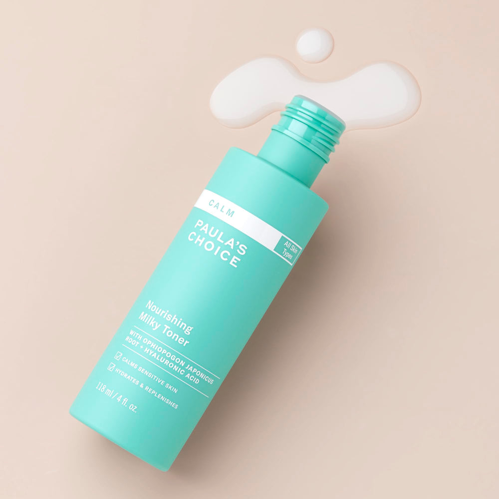 Texture of Paula's Choice Calm Nourishing Milky Toner shown on skin for soothing hydration.