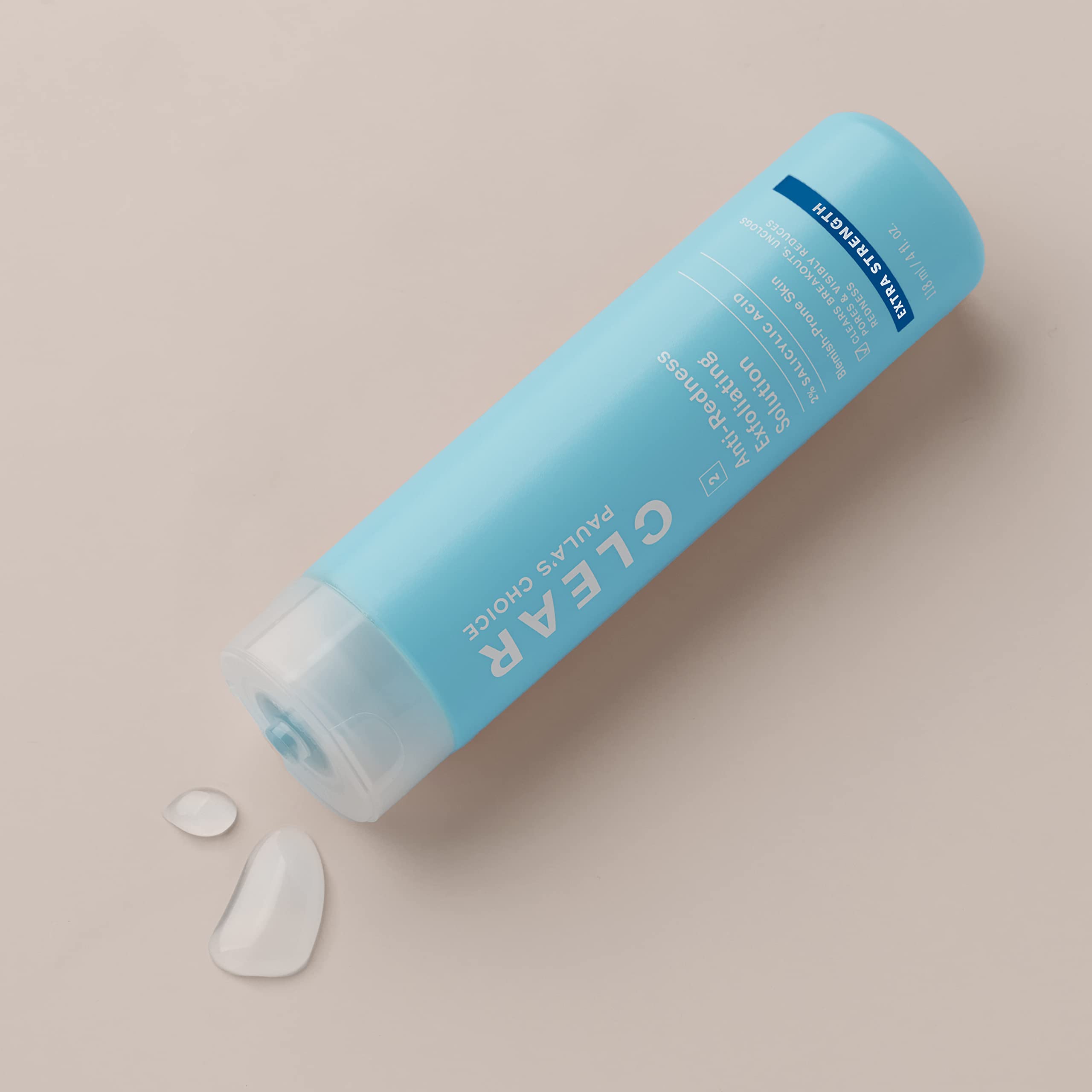 Close-up of Paula's Choice exfoliator texture ready to apply on skin.