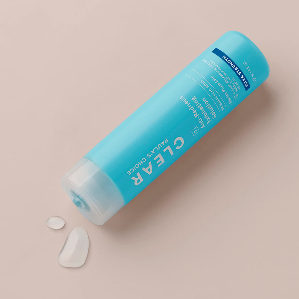 Close-up of Paula's Choice exfoliator texture ready to apply on skin.