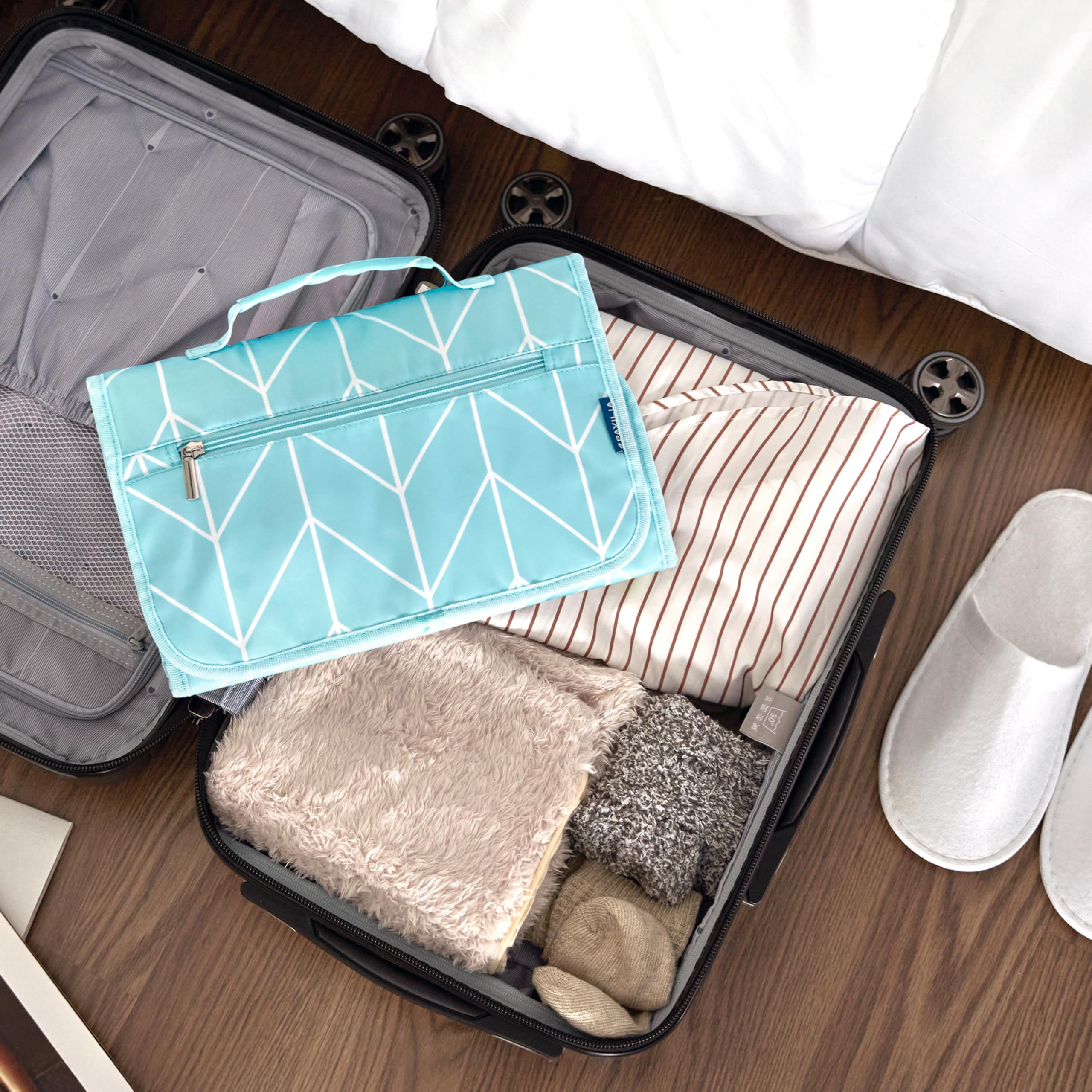 PAVILIA bag front pocket for quick item retrieval during travel.