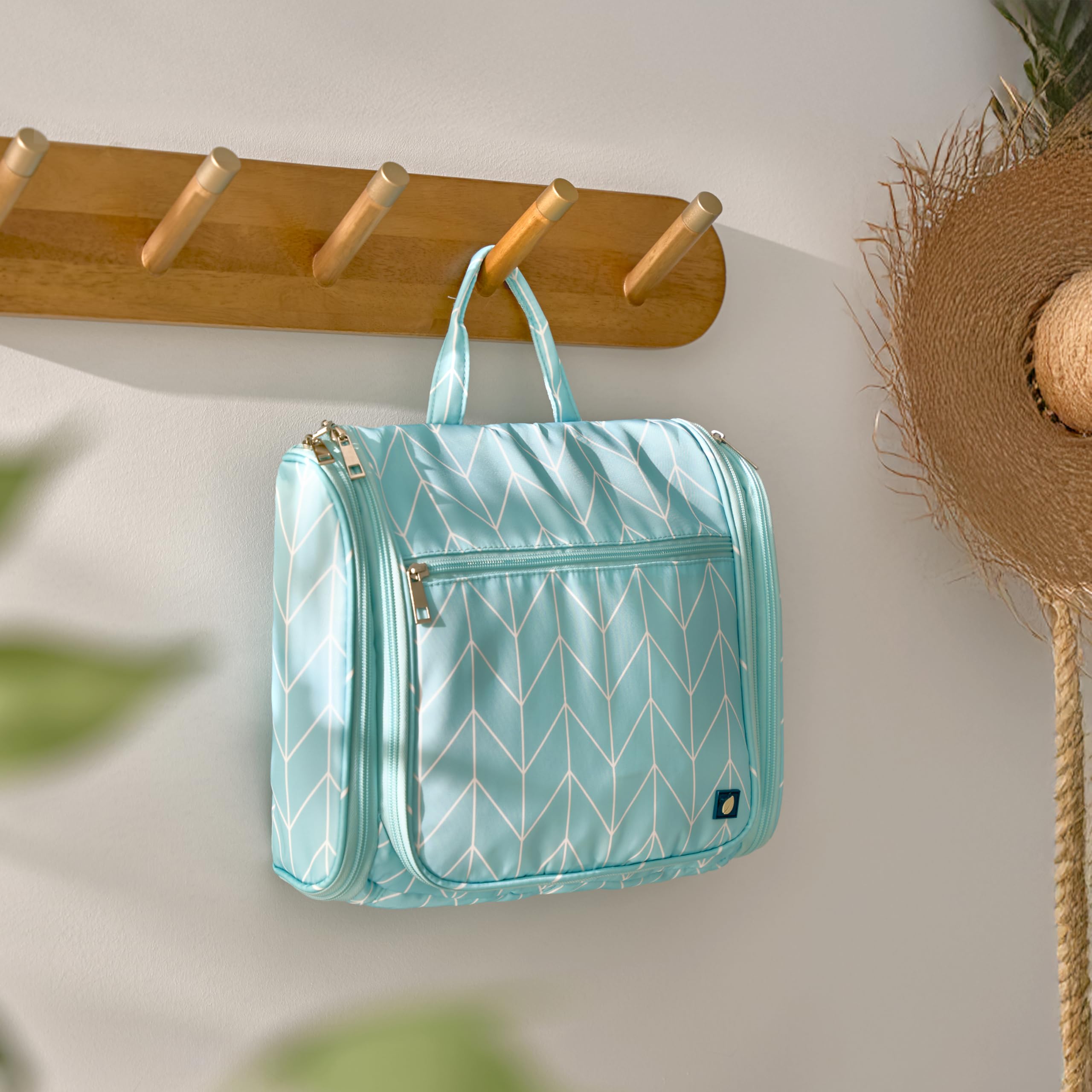 PAVILIA teal chevron features a hanging hook for easy bathroom access.