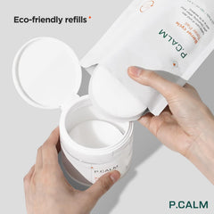 Close-up texture of P.CALM Barrier Cycle Toner Pad showing gentle exfoliation.