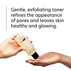 PCA SKIN toner bottle on a clean counter ready for daily skincare routine.