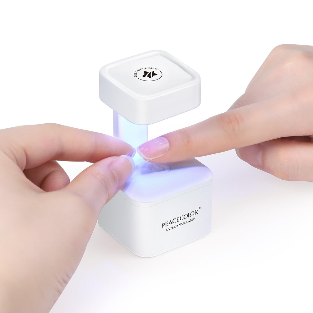 PEACECOLOR Mini UV nail lamp enabling quick-dry curing for home sessions