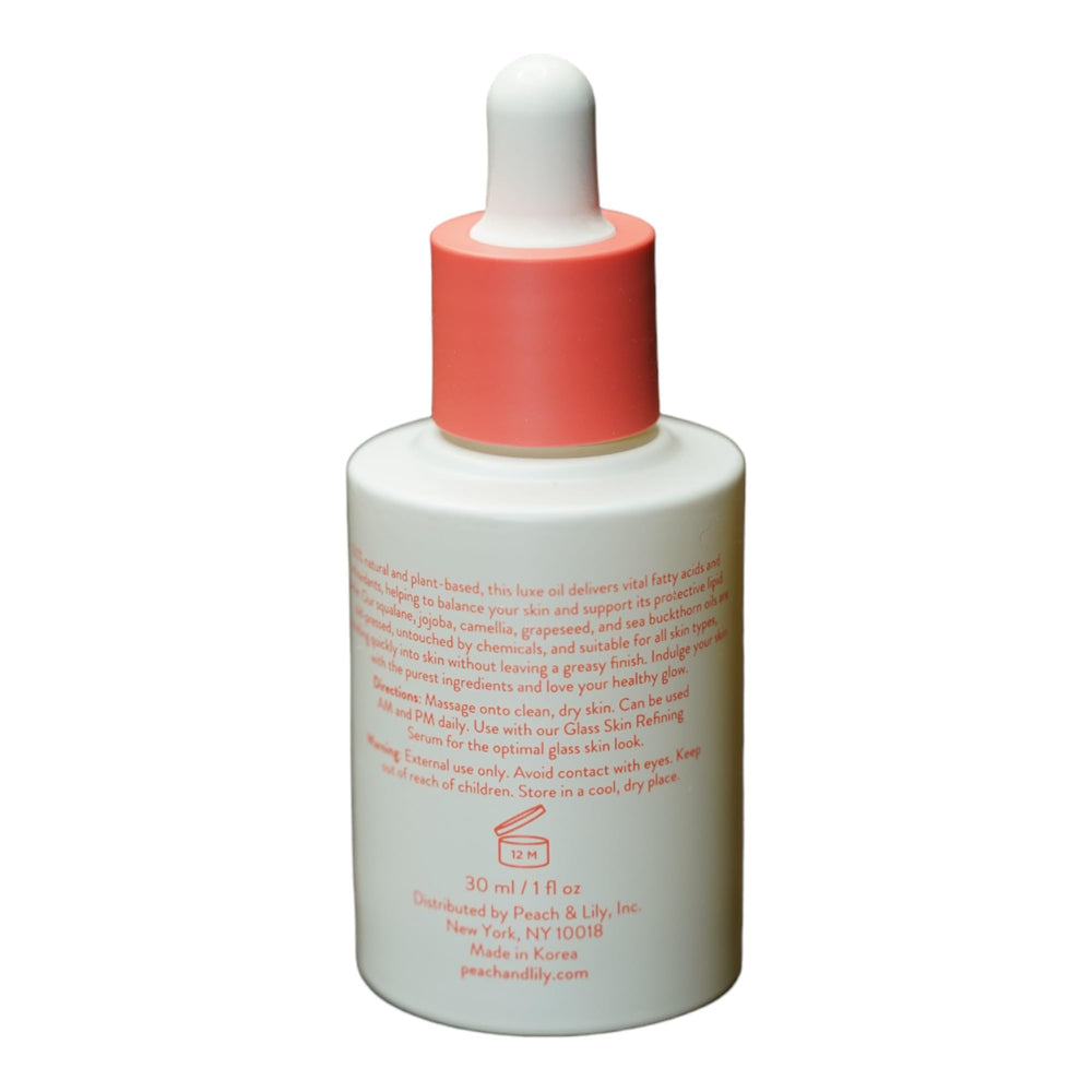 Peach & Lily Pure Beam Luxe Oil ingredients view highlights sea buckthorn, jojoba, and squalane