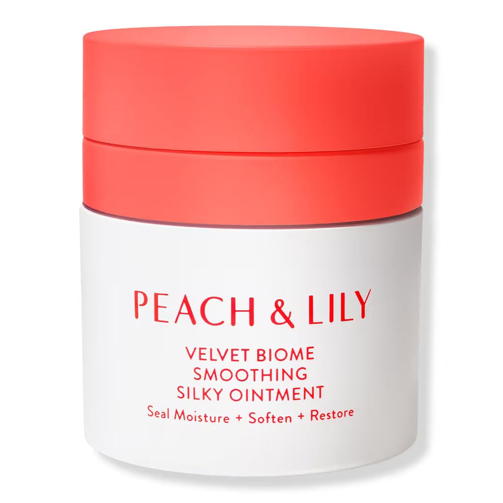 Peach Lily Velvet Biome Ointment tube closeup highlights sleek packaging and easy daily use.