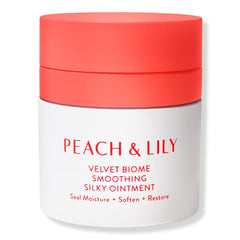 Peach Lily Velvet Biome Ointment tube closeup highlights sleek packaging and easy daily use.